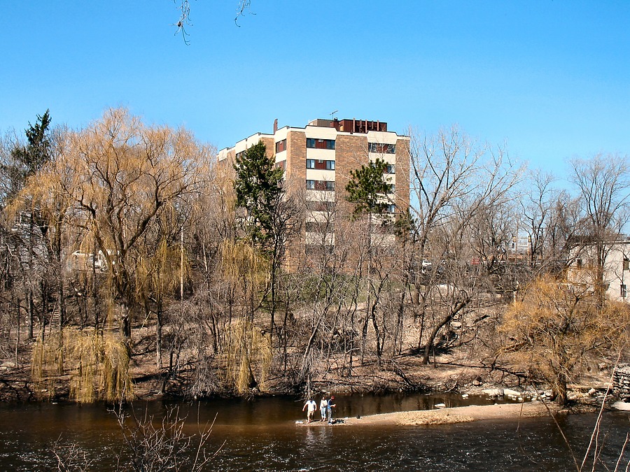 Walker on the River by James Peacock