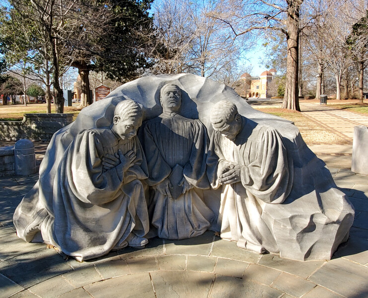Three Ministers Kneeling