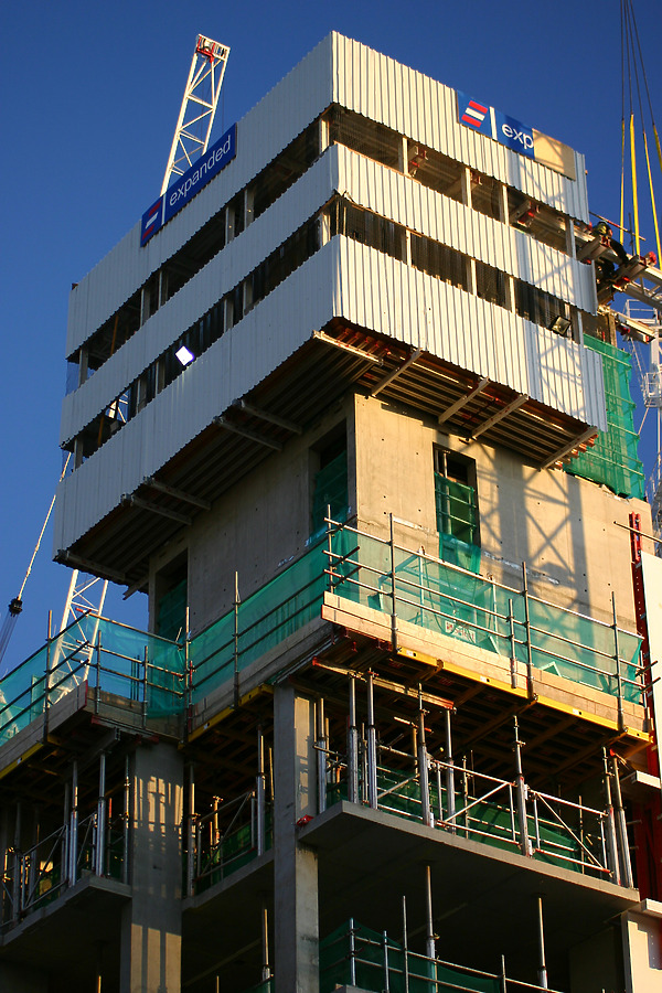 Pan Peninsula East Tower by Tristram Compton