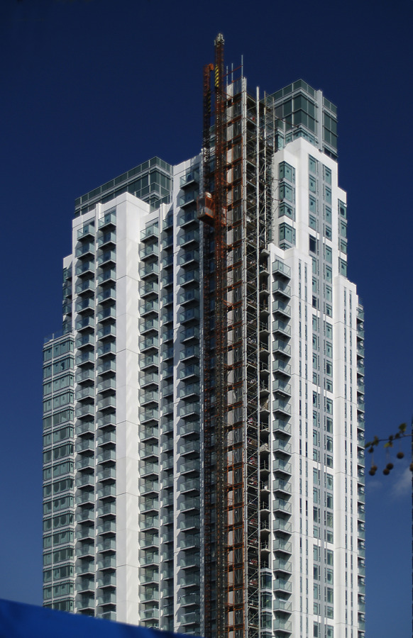 Pan Peninsula West Tower by Cesar Serrano