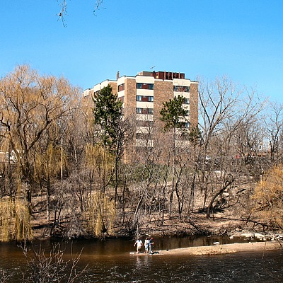 Walker on the River by James Peacock