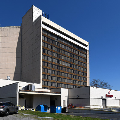 Ramada Plaza Hotel and Convention Center by John W. Cahill