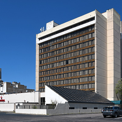 Ramada Plaza Hotel and Convention Center by John W. Cahill