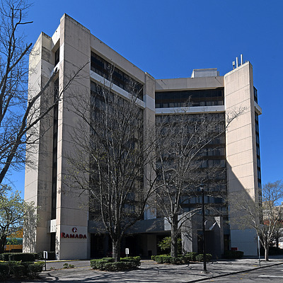Ramada Plaza Hotel and Convention Center by John W. Cahill